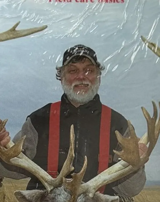 Russell Knight holding caribou antlers